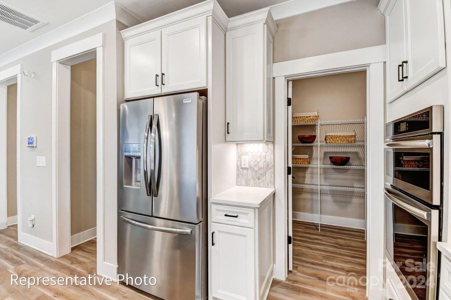 Mud Room is located off the kitchen - complete with Drop Zone