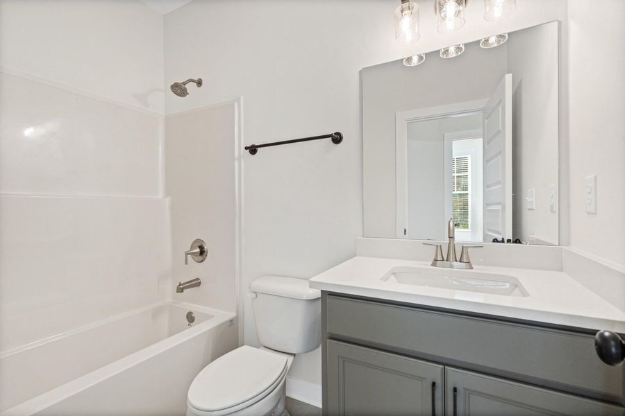 Furnished interior view inside a new home in Villages of Green Meadows, Munford (Image 11).