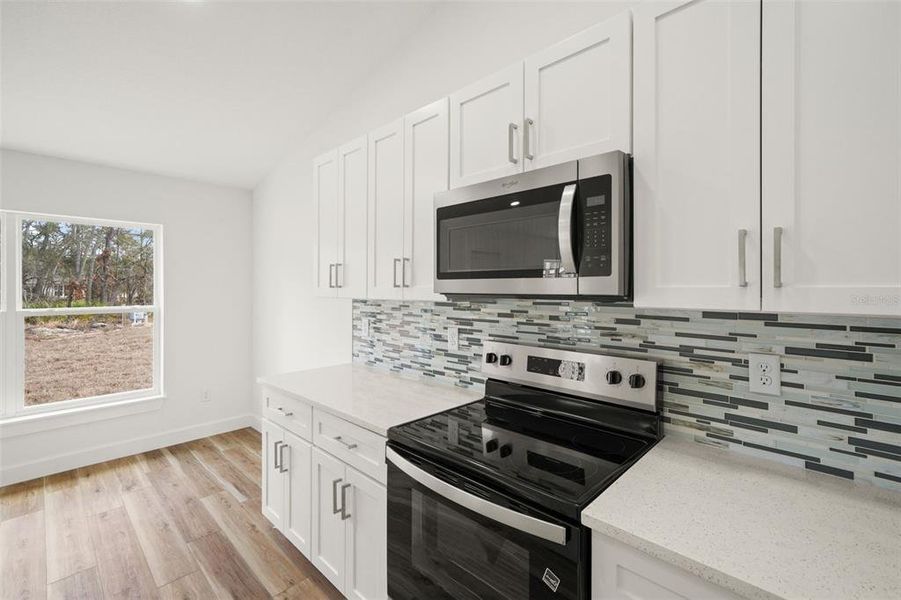 Furnished interior view inside a new home in , Weeki Wachee (Image 11).