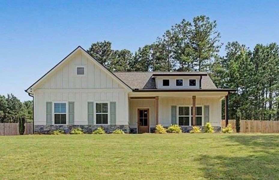 Front exterior of a new home in , Dallas, GA, highlighting curb appeal (Image 26).