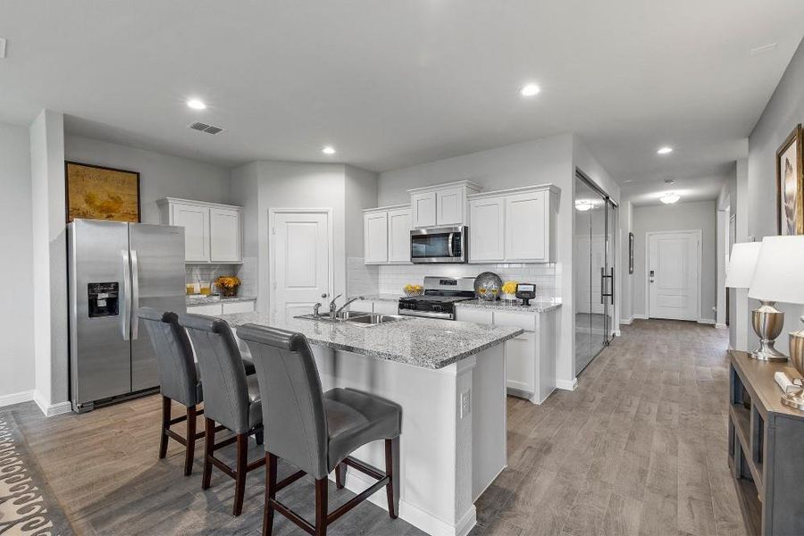 Kitchen - All Home and community information, including pricing, included features, terms, availability and amenities, are subject to change at any time without notice or obligation. All Drawings, pictures, photographs, video, square footages, floor plans, elevations, features, colors and sizes are approximate for illustration purposes only and will vary from the homes as built.