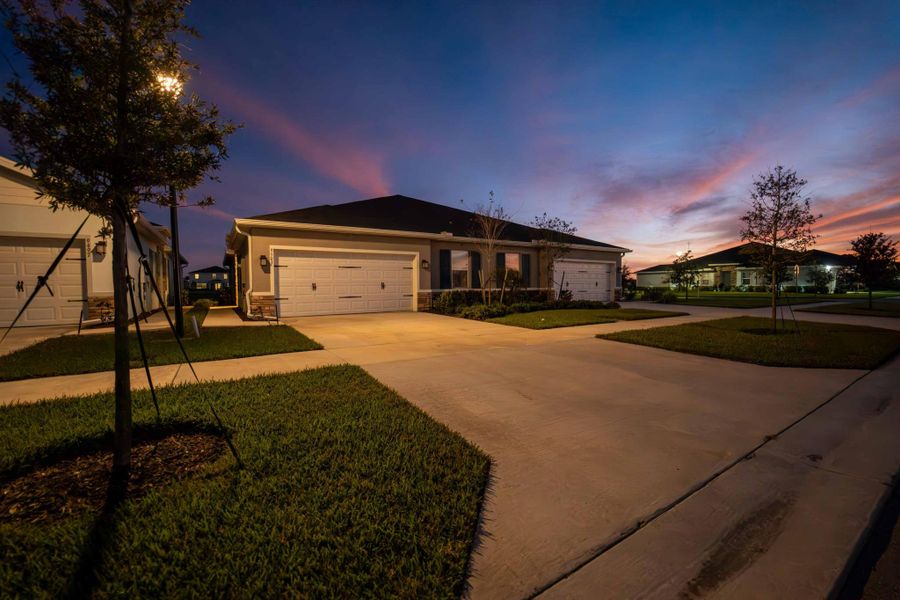 Front exterior of a new home in Central Park Villas, Port St. Lucie, FL, highlighting curb appeal (Image 1). Front exterior of a new home in Central Park Villas, Port St. Lucie, FL, highlighting curb appeal (Image 1).