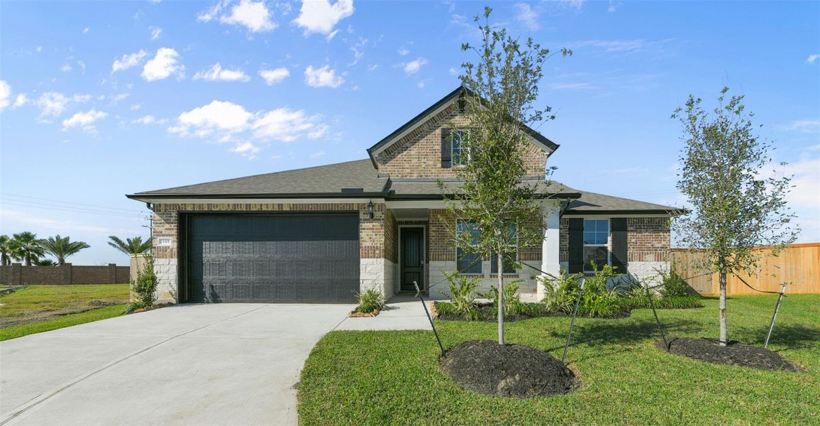 Front exterior of a new home in Lago Mar, Texas City, TX, highlighting curb appeal (Image 23).