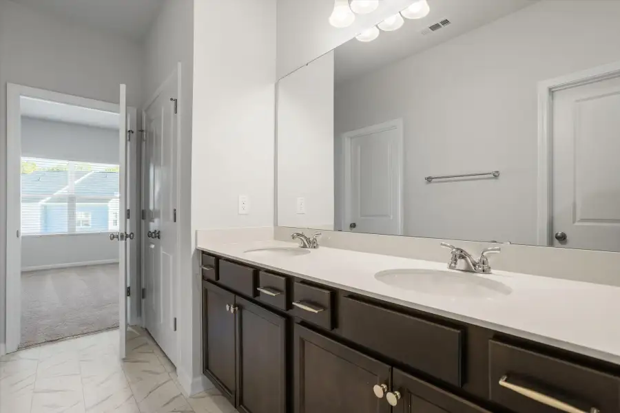 Furnished interior view inside a new home in West Main Townhomes, Sanford (Image 9).
