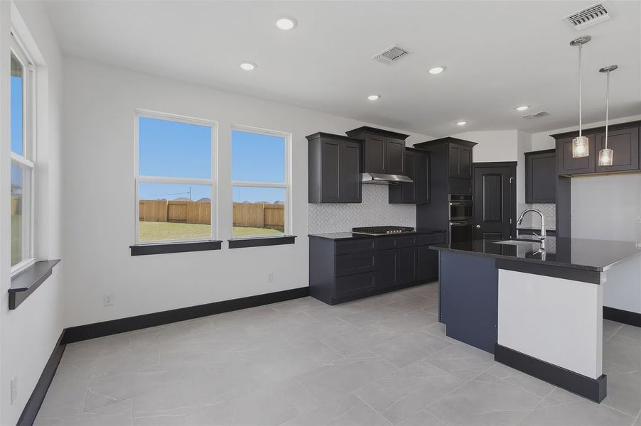 Representative furnished interior of a home built from the Bennington 2434 S 3CG by Saratoga Homes in Turnbo Ranch, Killeen (Image 3).