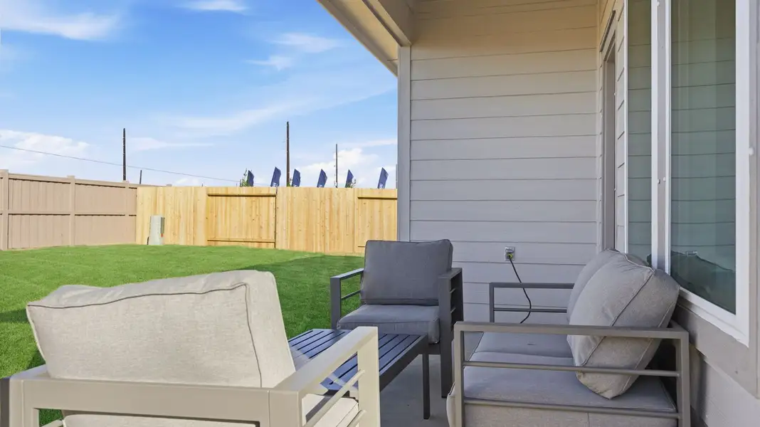 Exterior details and patio area of a home in Watermark, Alvin (Image 2).