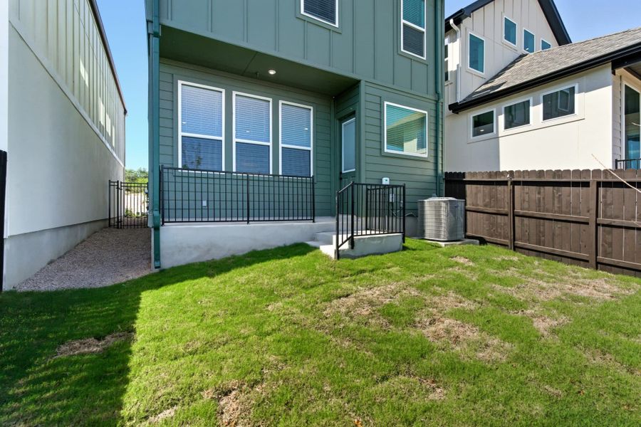 Exterior details and patio area of a home in Centero at Stone Oak, San Antonio (Image 3).