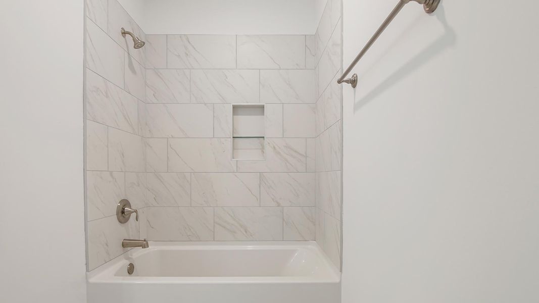 Representative furnished interior of a home built from the Camellia by D.R. Horton in Breakfast Point East Phase II, Panama City Beach (Image 15).