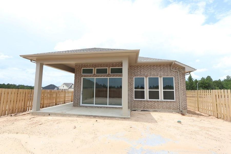 Front exterior of a new home in Colton 45' Homesites, Todd Mission, TX, highlighting curb appeal (Image 2). Front exterior of a new home in Colton 45' Homesites, Todd Mission, TX, highlighting curb appeal (Image 2).