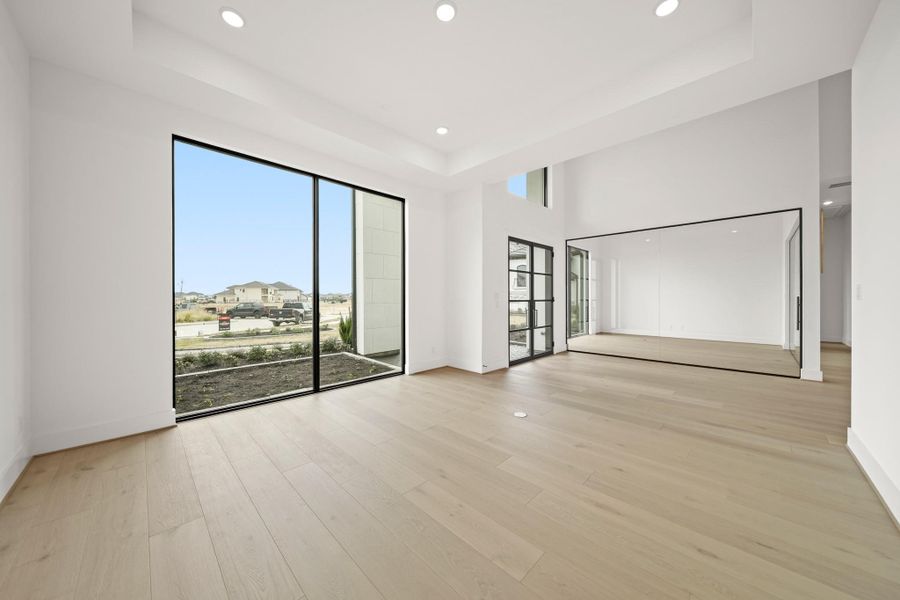 Spacious, unfurnished interior of a new home in Bridgeland, Cypress (Image 23).