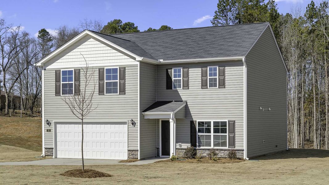 Front exterior of a new home in Country Creek, Lexington, NC, highlighting curb appeal (Image 20). Front exterior of a new home in Country Creek, Lexington, NC, highlighting curb appeal (Image 20).