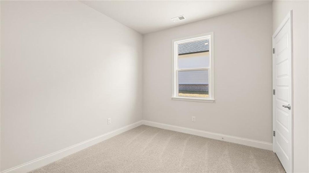 Spacious, unfurnished interior of a new home in Oak Ridge Meadows - Active Adult, Locust Grove (Image 44).