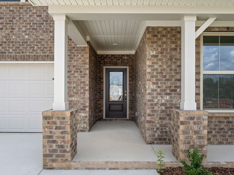 Exterior details and patio area of a home in Woods Crossing, Gallatin (Image 3).