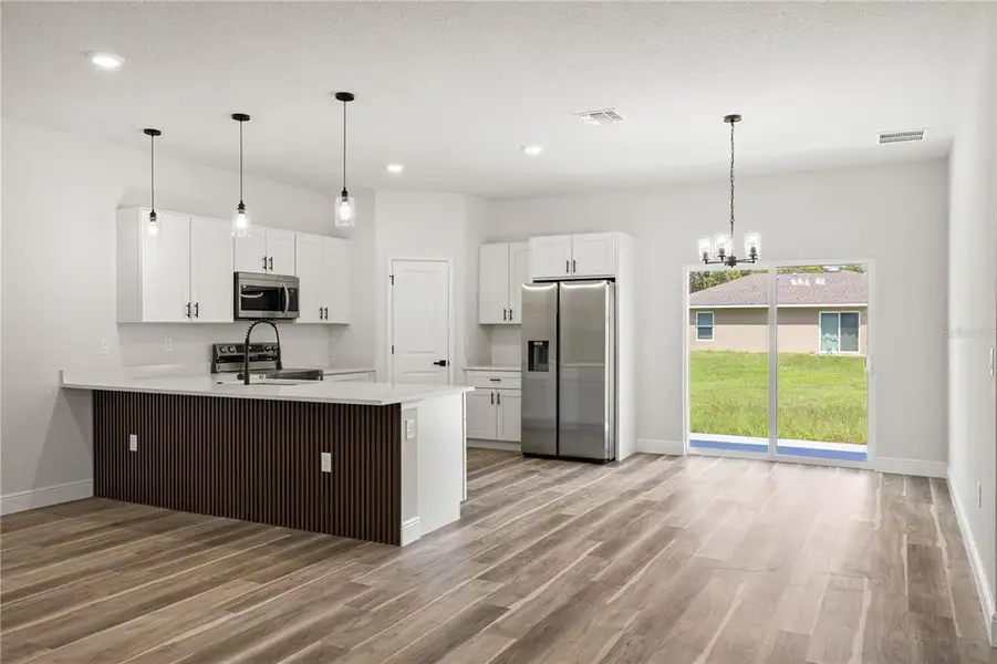 Furnished interior view inside a new home in , Ocala (Image 3).