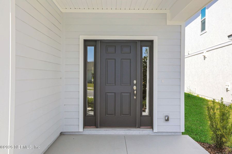 Exterior details and patio area of a home in Amberly, Green Cove Springs (Image 3).