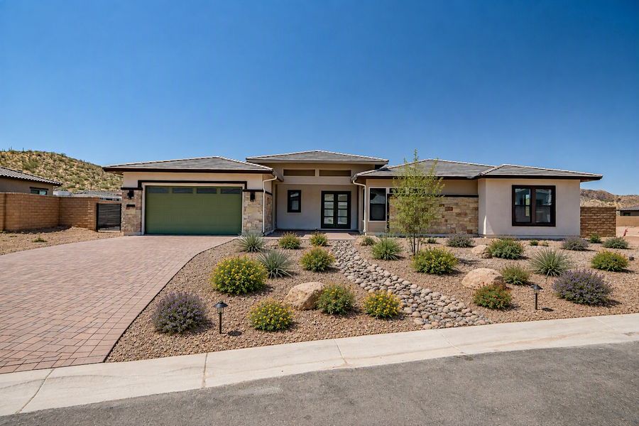 Front exterior of a new home in Estates at Kings Ranch, Gold Canyon, AZ, highlighting curb appeal (Image 28). Front exterior of a new home in Estates at Kings Ranch, Gold Canyon, AZ, highlighting curb appeal (Image 28).