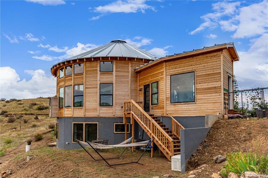 Front exterior of a new home in , Lyons, CO, highlighting curb appeal (Image 27).
