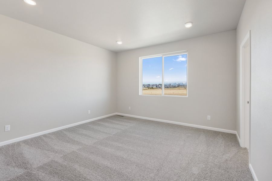 Spacious, unfurnished interior of a new home in Highlands Preserve, Mead (Image 15).