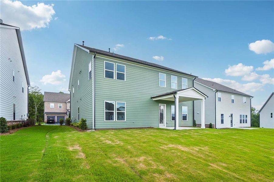 Exterior details and patio area of a home in East Harbor II at Chestatee, Dawsonville (Image 4).