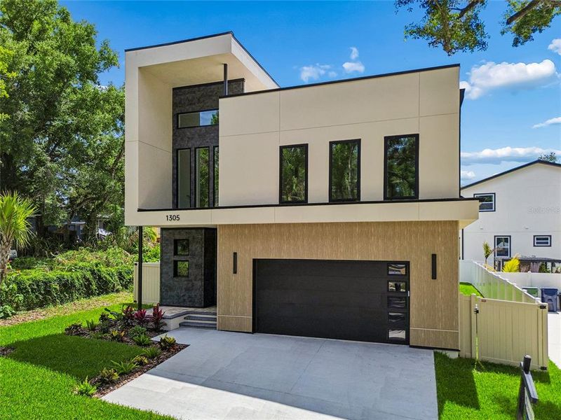Front exterior of a new home in , Tampa, FL, highlighting curb appeal (Image 31).