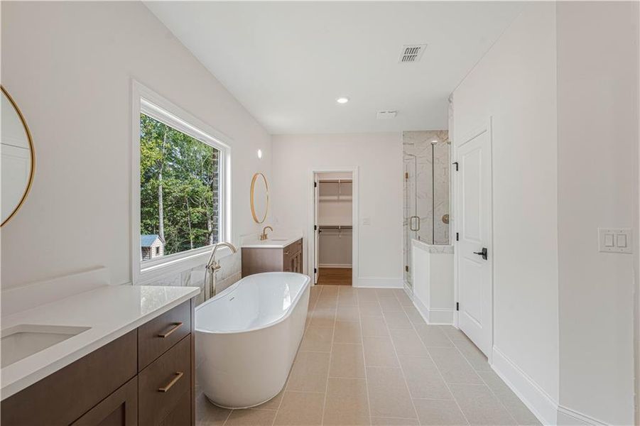 Furnished interior view inside a new home in Bellwyn, Johns Creek (Image 27).