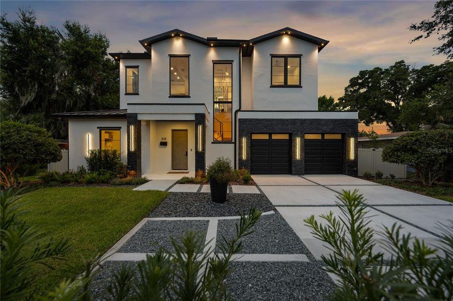 Front exterior of a new home in , Winter Park, FL, highlighting curb appeal (Image 26). Front exterior of a new home in , Winter Park, FL, highlighting curb appeal (Image 26).