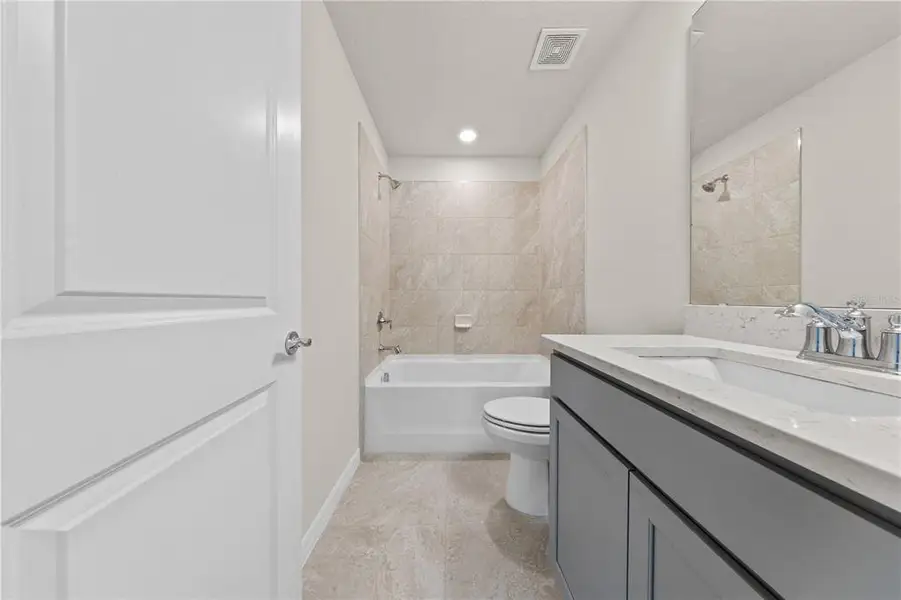 Furnished interior view inside a new home in EverBe, Orlando (Image 12).