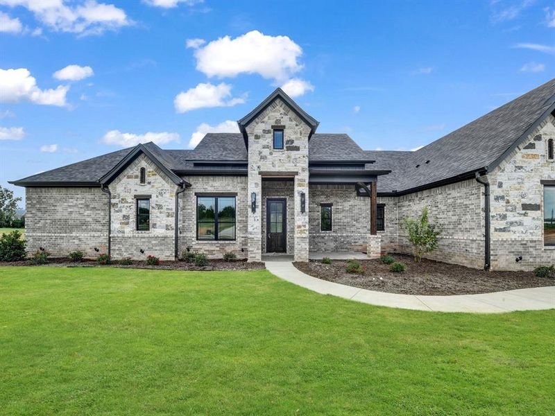 Front exterior of a new home in , Weatherford, TX, highlighting curb appeal (Image 21).