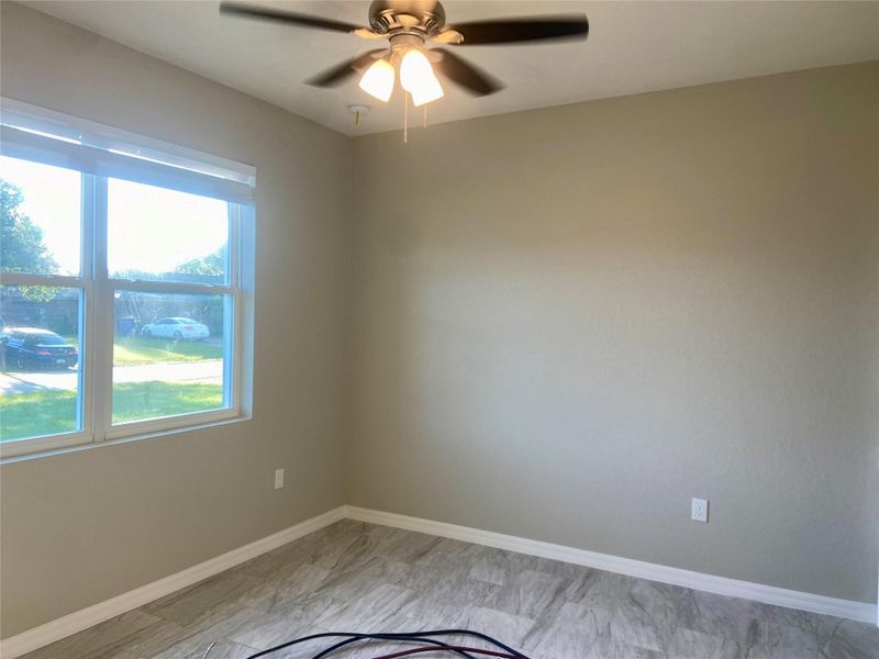 hall bath with tub/shower combo, granite counter tops