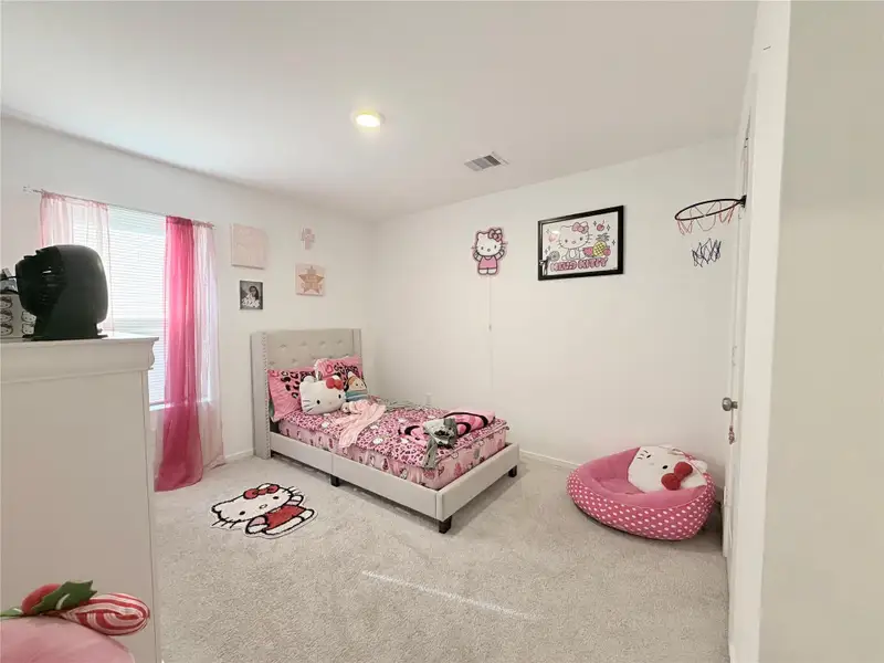 Furnished interior view inside a new home in Sunterra, Katy (Image 7).