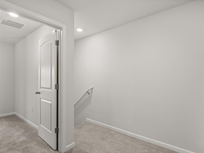 Spacious, unfurnished interior of a new home in Waypoint, Flowery Branch (Image 19).