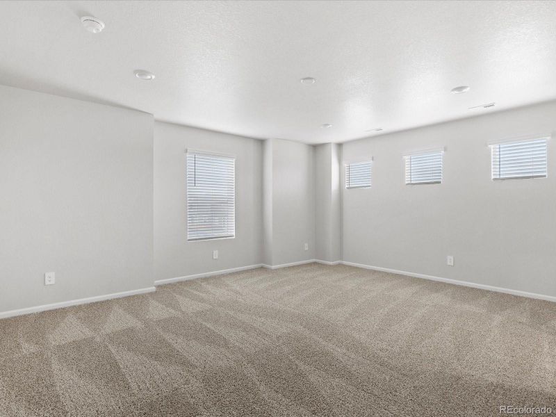 Spacious, unfurnished interior of a new home in Ridgeline Vista: The Flora Collection, Brighton (Image 27). Spacious, unfurnished interior of a new home in Ridgeline Vista: The Flora Collection, Brighton (Image 27).