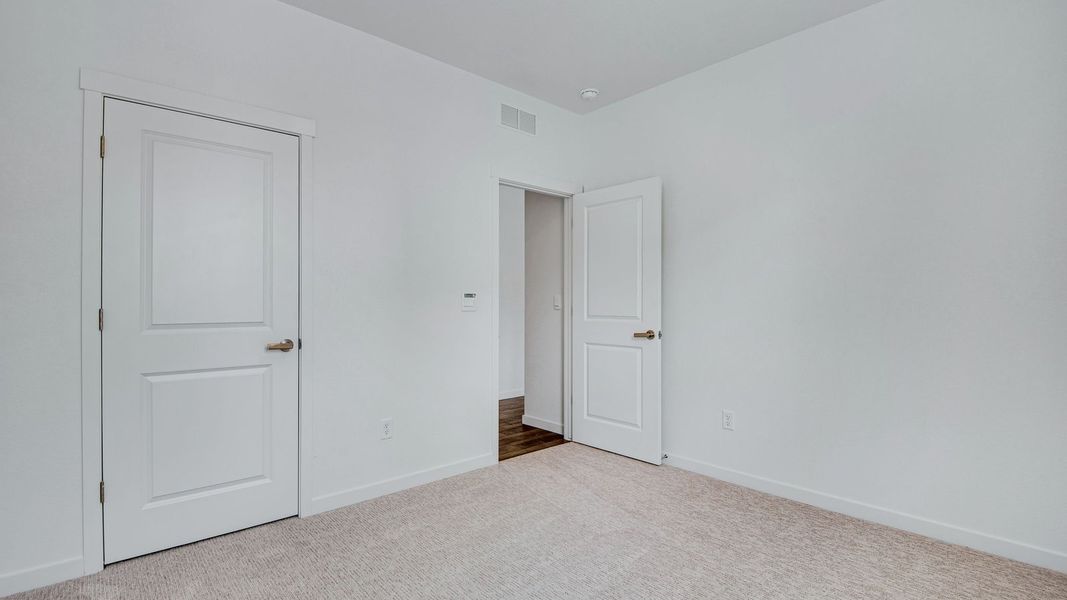 Spacious, unfurnished interior of a new home in Trails at Crowfoot, Parker (Image 34).