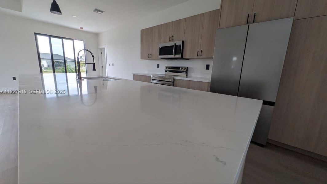 Furnished interior view inside a new home in , Labelle (Image 7).