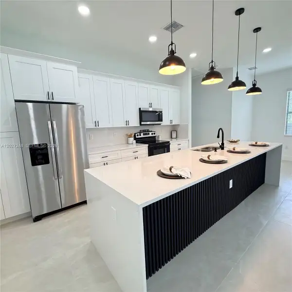 Furnished interior view inside a new home in , Lehigh Acres (Image 11).