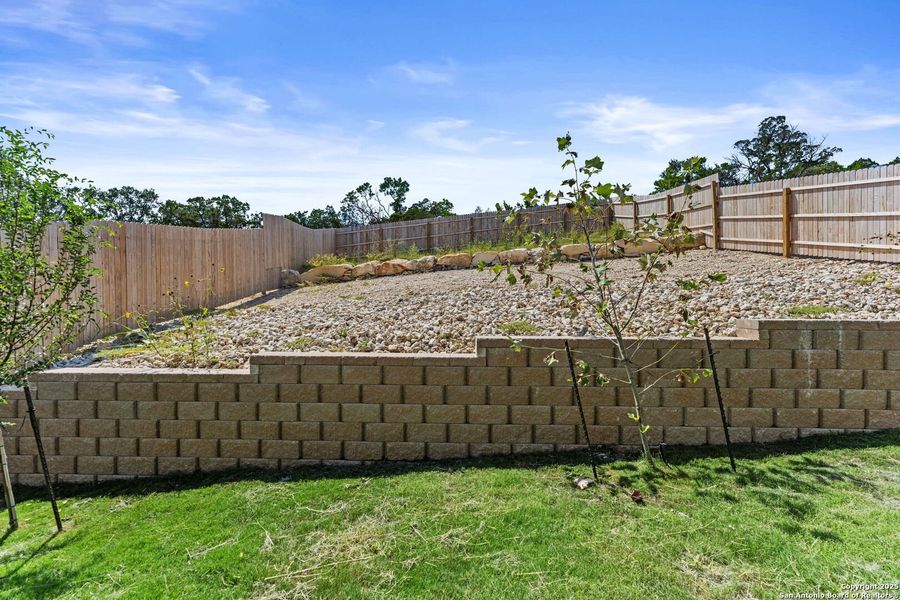 Front exterior of a new home in Waterwheel: Coastline Collection, San Antonio, TX, highlighting curb appeal (Image 2). Front exterior of a new home in Waterwheel: Coastline Collection, San Antonio, TX, highlighting curb appeal (Image 2).