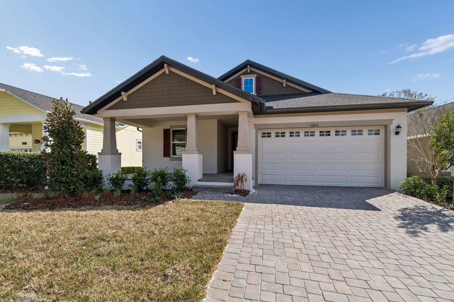 Front exterior of a new home in Southern Hills Plantation, Brooksville, FL, highlighting curb appeal (Image 28).