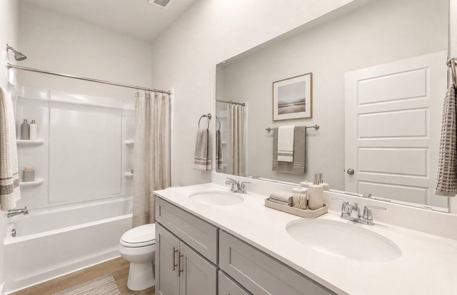 Representative furnished interior of a home built from the Taft by Pulte Homes in Crosswinds, Kyle (Image 5).