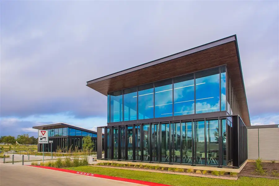 Front exterior of a new home in Easton Park, Austin, TX, highlighting curb appeal (Image 8).