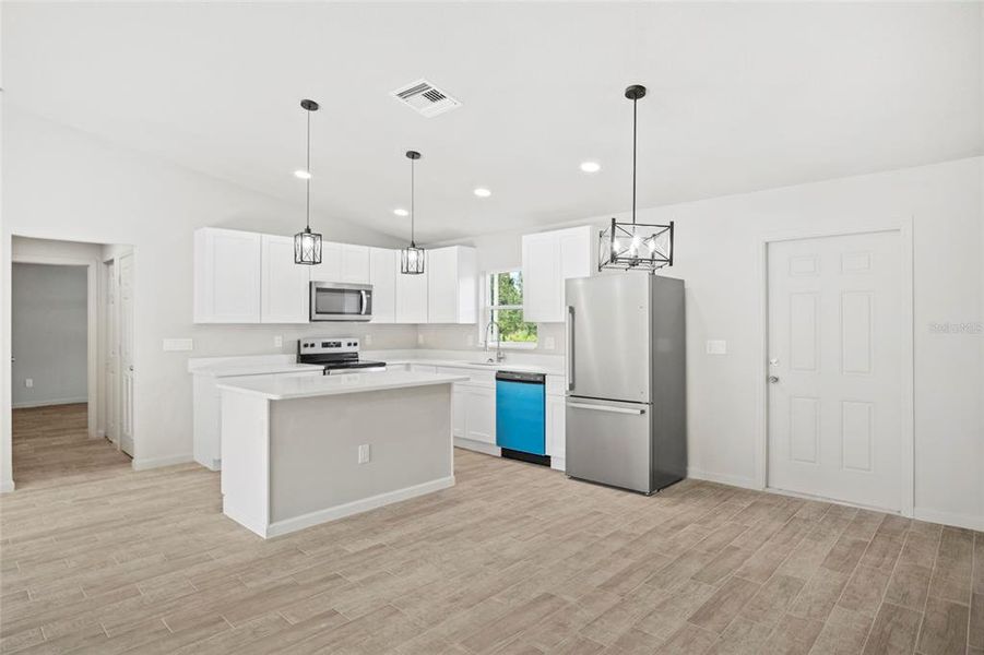Furnished interior view inside a new home in , Okeechobee (Image 8).