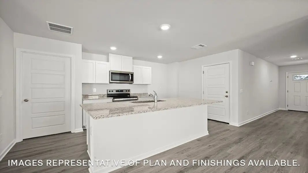 Representative furnished interior of a home built from the ASPEN by D.R. Horton in Morford, Jackson (Image 4).