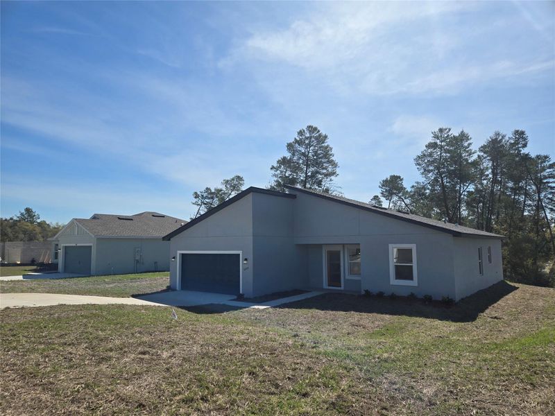 Exterior details and patio area of a home in , Ocala (Image 24).