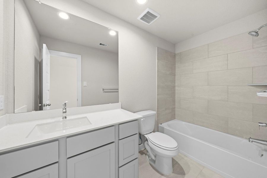 Furnished interior view inside a new home in Barton Creek Ranch, Conroe (Image 7).