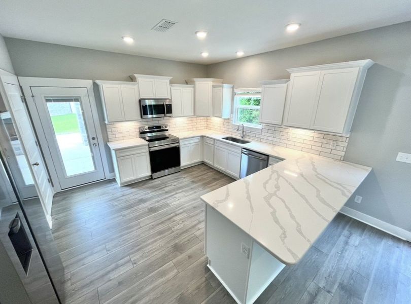 I can see some serious family gatherings here. A separate formal dining room is off of foyer at the entrance. I can see some serious family gatherings here. A separate formal dining room is off of foyer at the entrance.