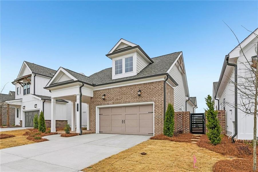 Front exterior of a new home in Aberdeen, Hoschton, GA, highlighting curb appeal (Image 27). Front exterior of a new home in Aberdeen, Hoschton, GA, highlighting curb appeal (Image 27).