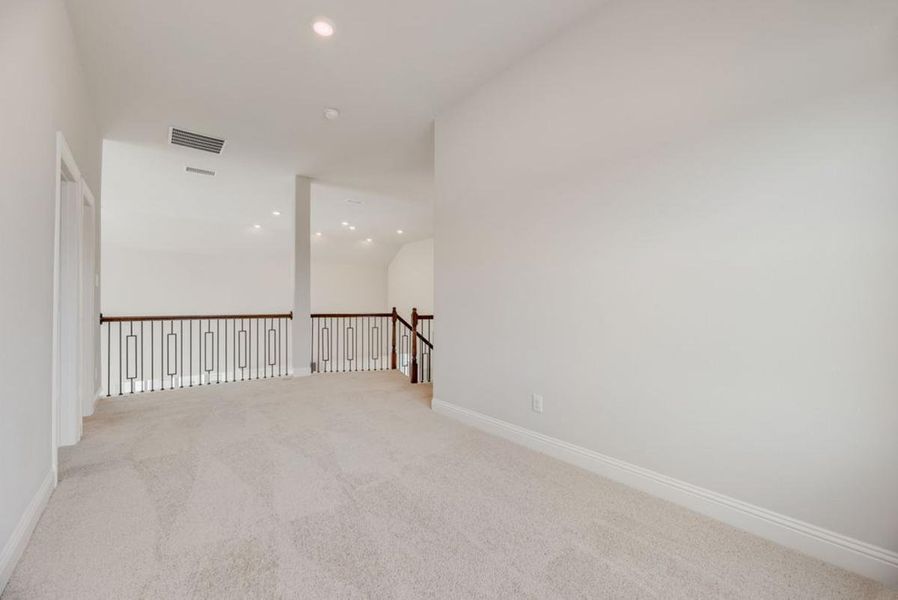 Spacious, unfurnished interior of a new home in Trails at Cottonwood Creek, Rowlett (Image 14).