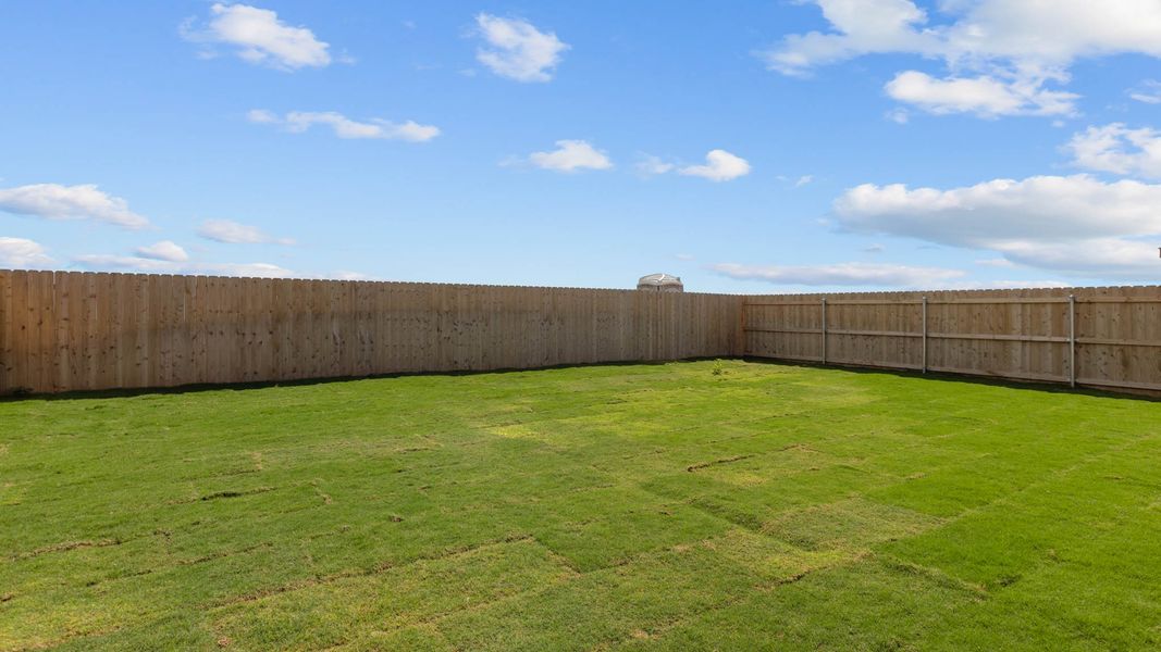 Representative exterior photo of a completed home built from the The Oxford by D.R. Horton in Allen Farms, Lubbock, TX (Image 16).