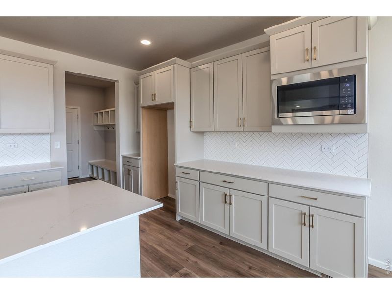 Furnished interior view inside a new home in Prairie Song Story Collection - Single Family Homes, Windsor (Image 8).