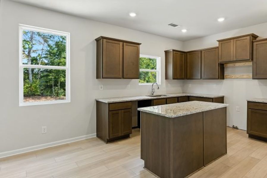 Representative furnished interior of a home built from the Brentwood by Piedmont Residential in Falls Creek, Flowery Branch (Image 5).