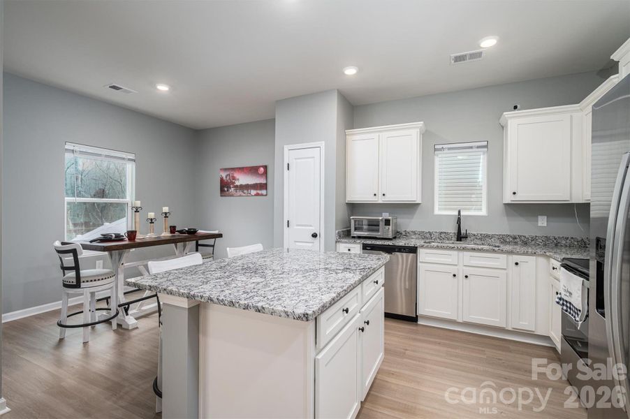 Furnished interior view inside a new home in Stagecoach Station, Gastonia (Image 33).